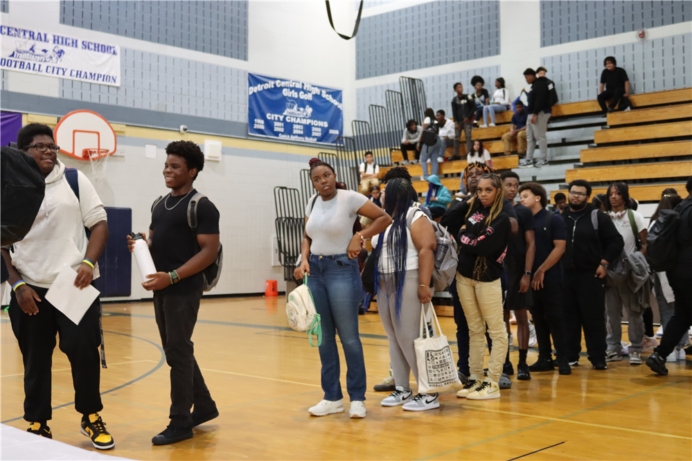  Students standing line in the gym